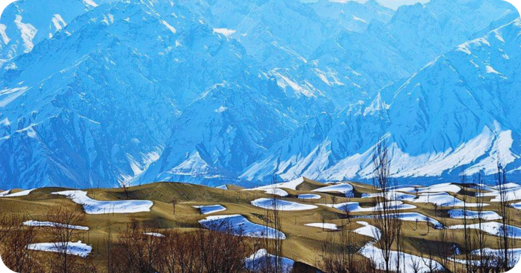 “Top best places to visit in Skardu: Katpana Cold Desert with sand dunes and rugged mountains.”