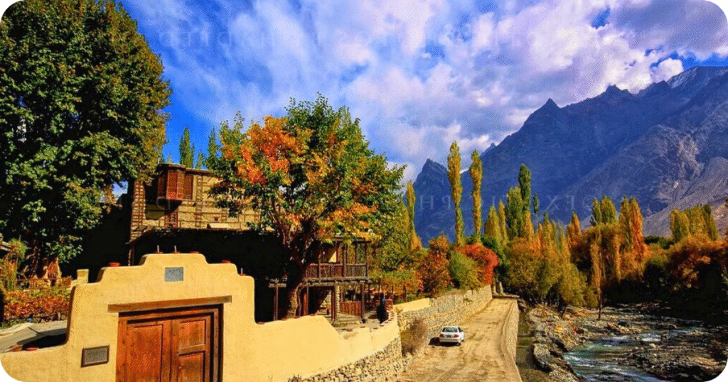 “Top best places to visit in Skardu: Shigar Valley with green fields and surrounding mountains.”