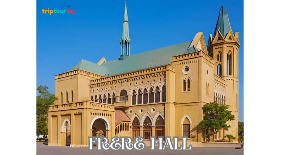 Frere Hall Karachi, showcasing the historic colonial-era building with Gothic architecture, surrounded by green lawns and trees under a clear sky.