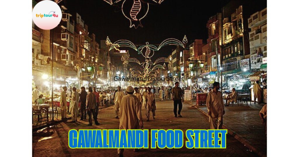 Gawalmandi Food Street at night in Lahore, bustling with people, traditional food stalls, and decorative lights illuminating the historic street.