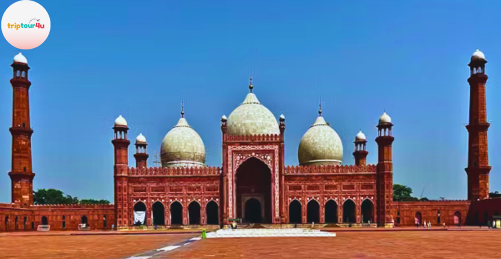 Badshahi Mosque Lahore with its grand red sandstone architecture and large courtyard.
