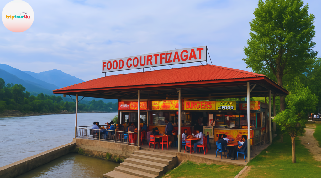Food Court Fizagat with multiple food stalls, outdoor seating, and a lively riverside atmosphere in Swat.