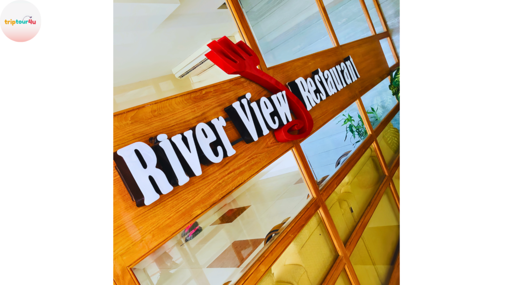 River View Restaurant in Swat featuring outdoor seating beside the flowing river with a peaceful natural atmosphere.