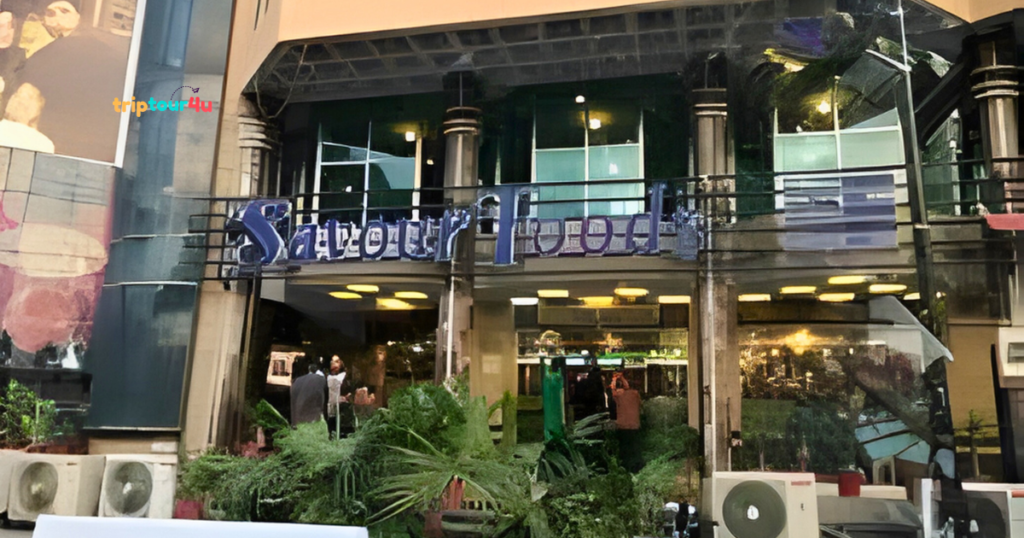 Savour Foods Islamabad famous pulao and shami kebab served with raita at a busy Savour Foods restaurant, showcasing one of the most popular traditional food points in Islamabad.