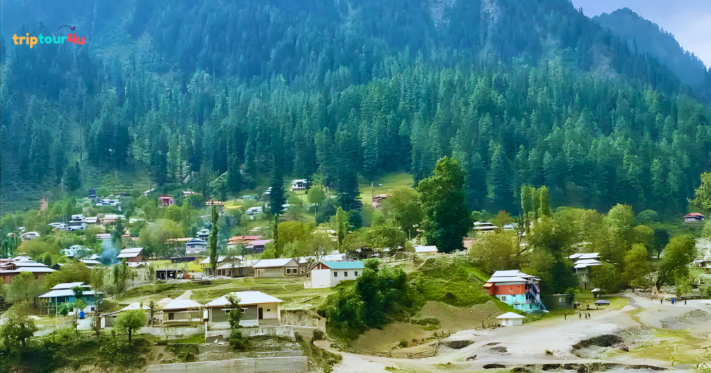 Sharda village in Neelum Valley, Pakistan, featuring ancient Sharda Peeth ruins, lush green mountains, and the flowing Neelum River under clear skies.