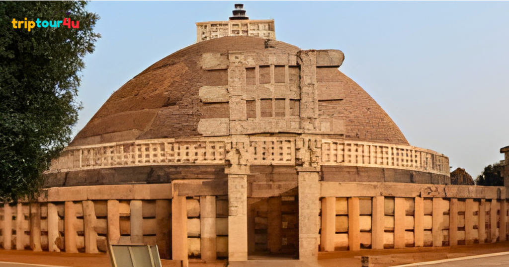 Buddhist-era Stupa at Mohenjo-Daro, built atop ancient Indus Valley ruins, showing brick structure and historical significance.