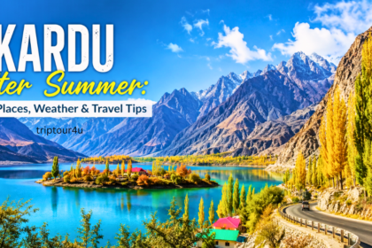 Skardu after summer travel at Upper Kachura Lake featuring turquoise crystal-clear water, colorful autumn poplar trees, a winding mountain road, and rugged Karakoram peaks beneath a bright blue sky.